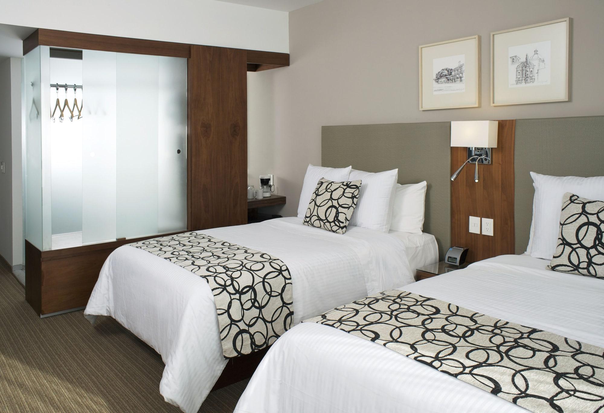 Casa Inn Premium Hotel Queretaro Miranda Eksteriør bilde A typical room at the Westin