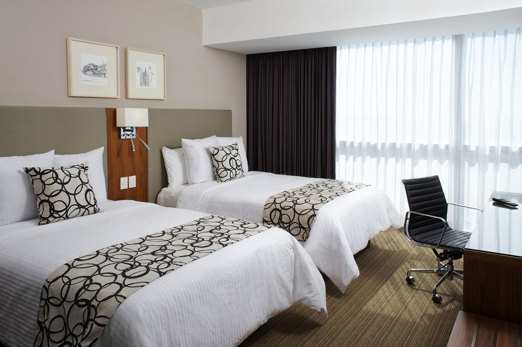 Casa Inn Premium Hotel Queretaro Miranda Eksteriør bilde A room at the hotel